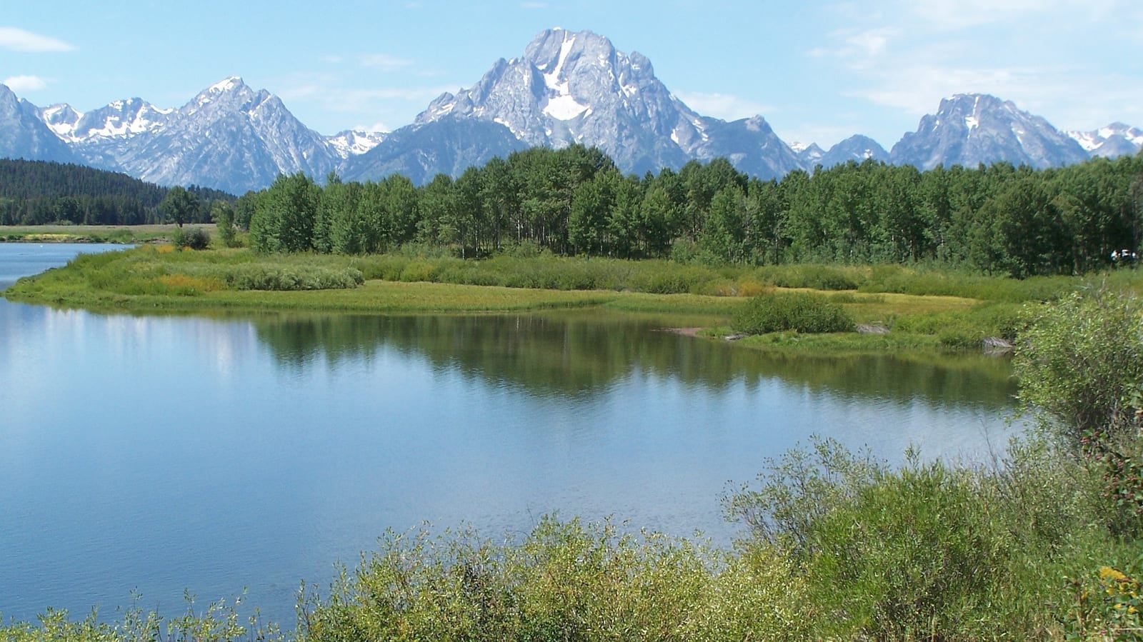Grand Teton National Park, Oxbow Bend. The snow-capped Grand Teton reflected in the Snake River.
