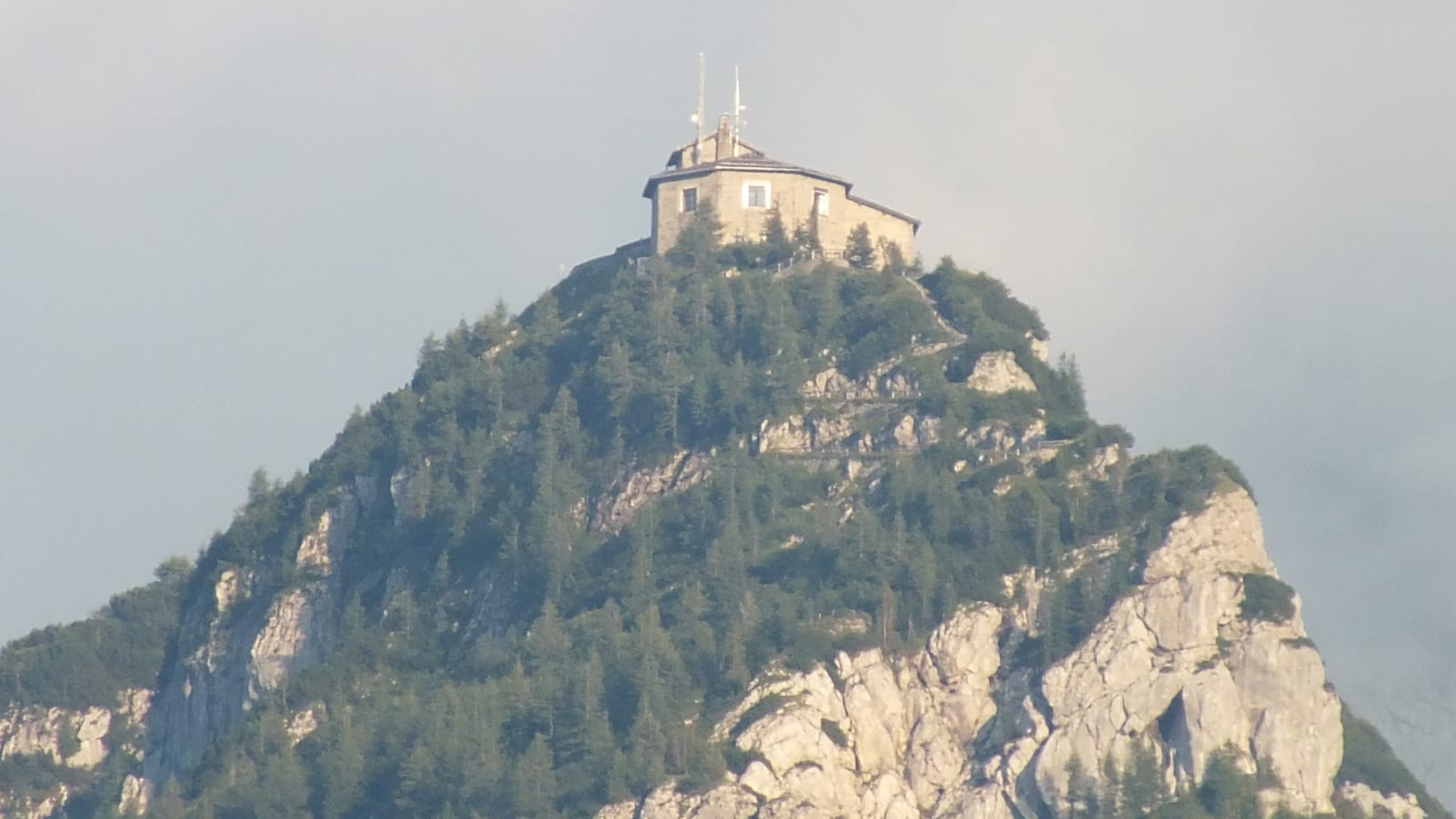Berchtesgaden Alps. The Untersberg, summit cross and view over Bavaria.