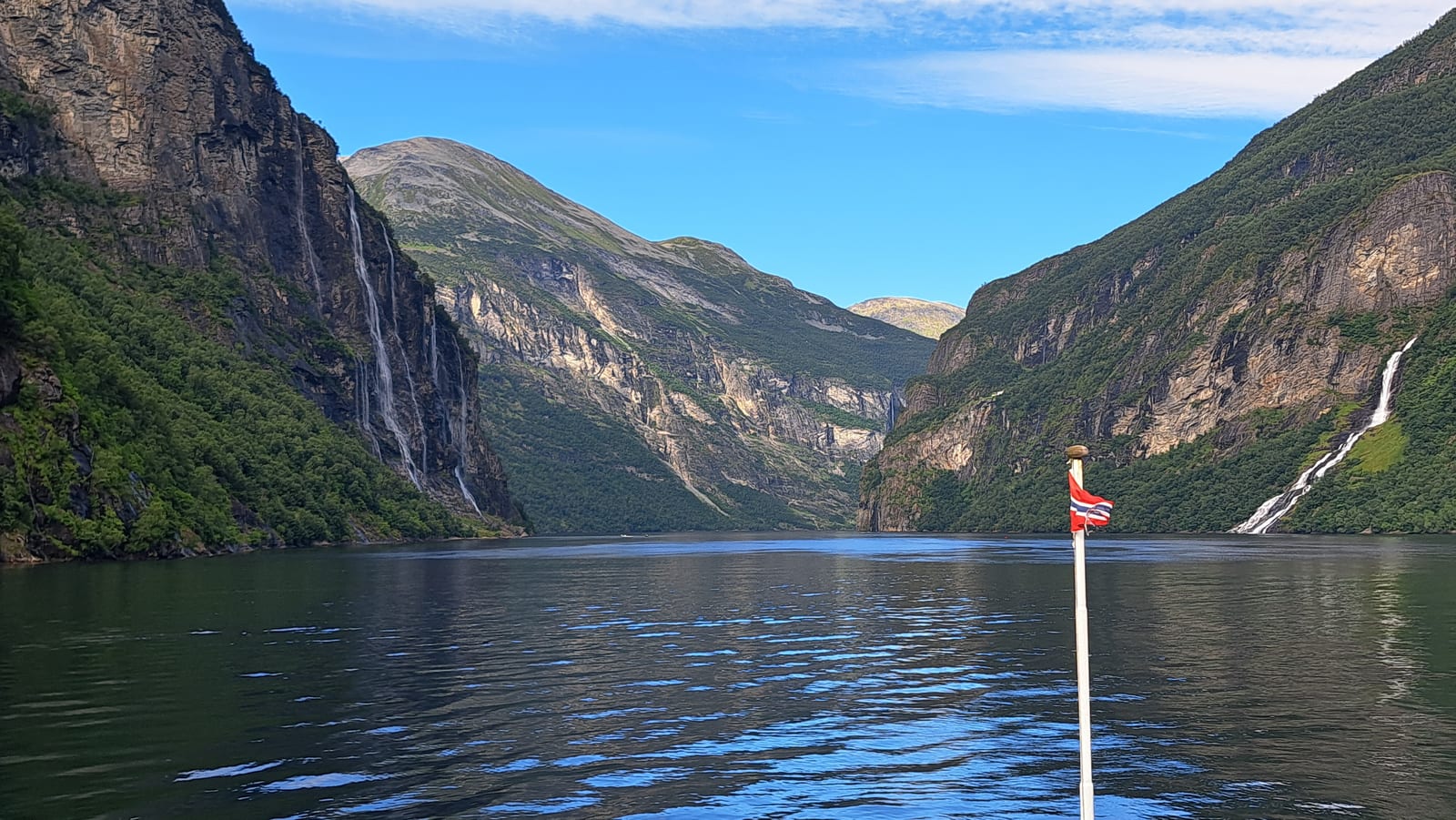 Cruising the Geirangerfjord, between the sheer walls and the waterfalls