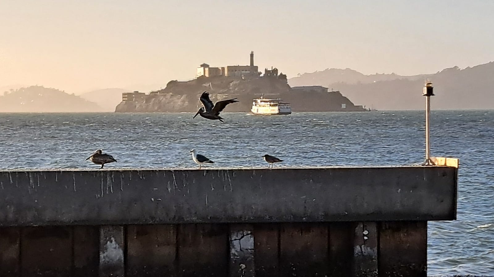 Sunset over Alcatraz, seen from the pier near Fisherman's Wharf