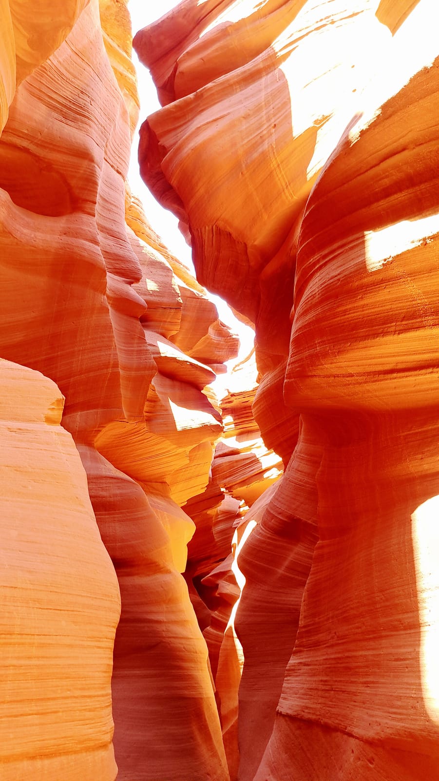 Sunlight filtering into the sandstone corridors of Lower Antelope Canyon