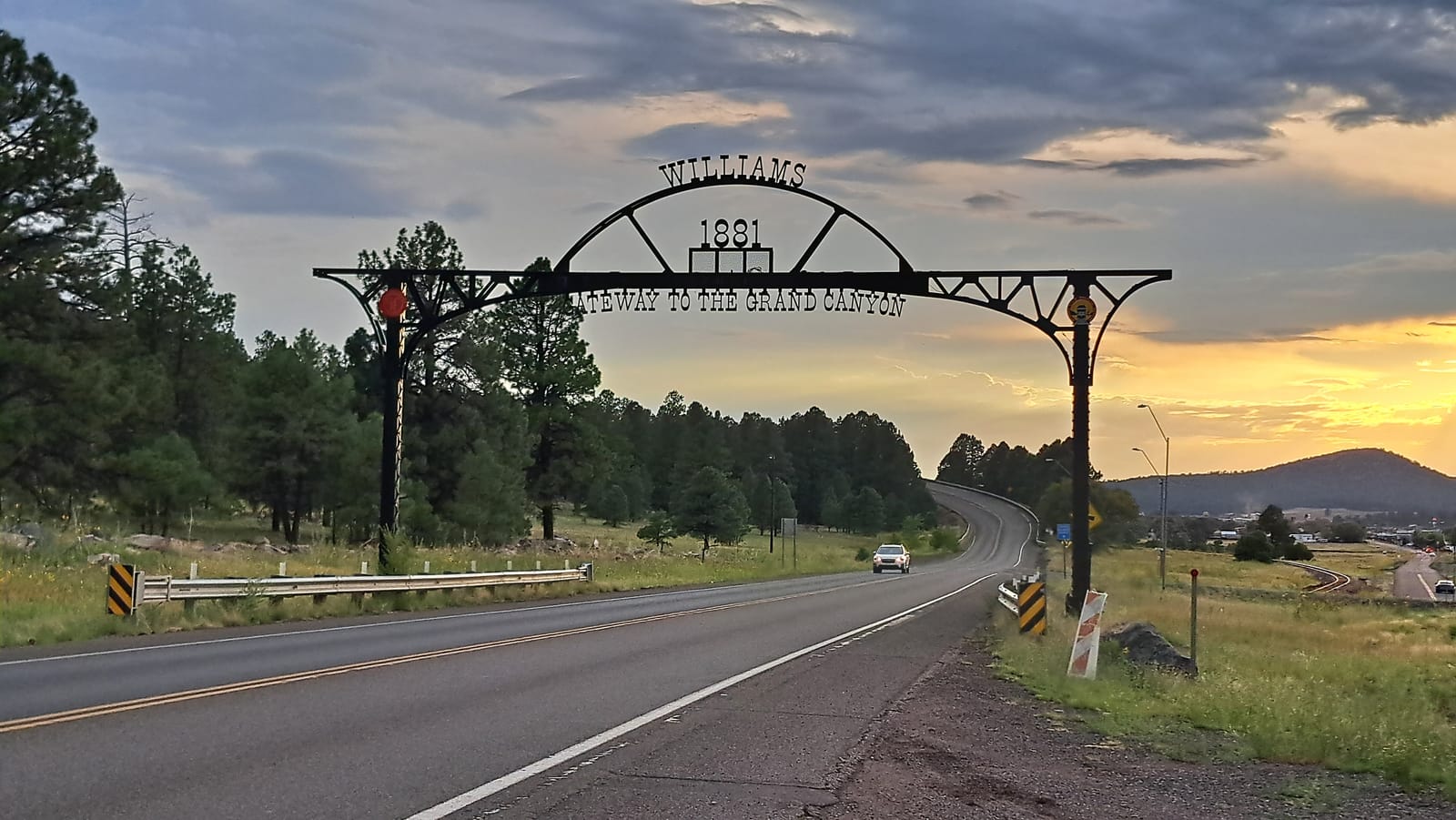The Williams arch at dusk, marking the town's Route 66 heritage